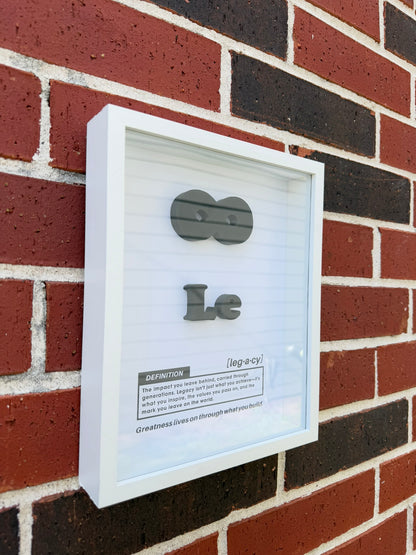 Handmade Legacy definition shadow box with weight plates forming an infinity symbol